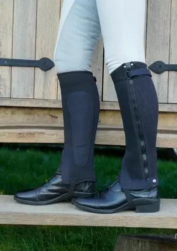 Side view of a pair of All-Purpose neoprene half chaps in black by Just Chaps
