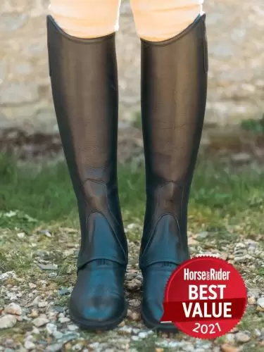 Horse rider wearing Saltos leather riding gaiters in black by Just Chaps