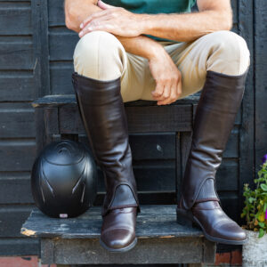leather half chaps worn by male rider in shorter length