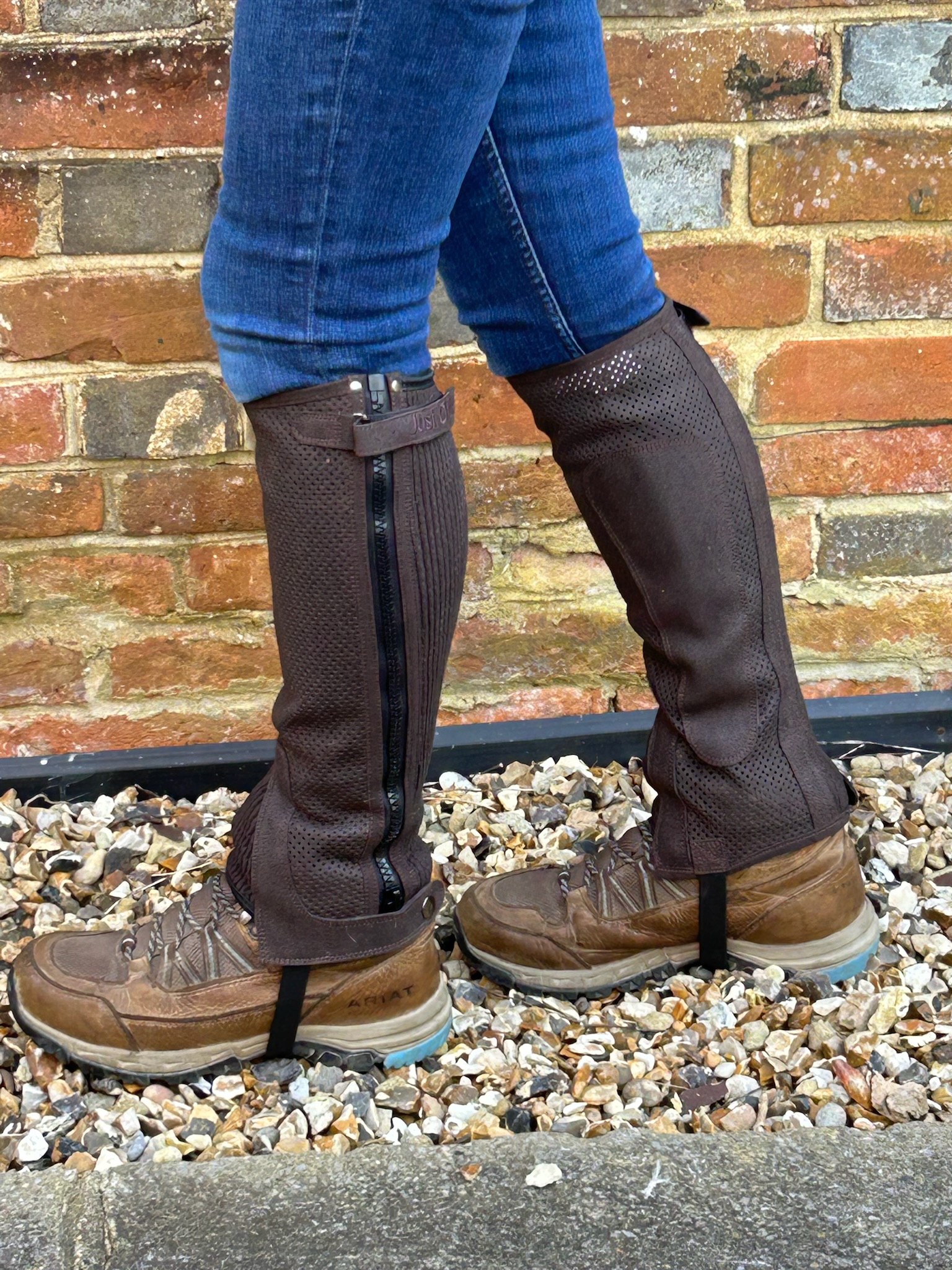 rider wearing Summer Cool half chaps and chunky riding boots.